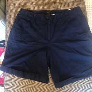 Talbots Navy blue shorts with button cuff.